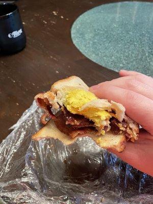 Bacon, Egg, and Cheese on toast (minus two slices of bacon)