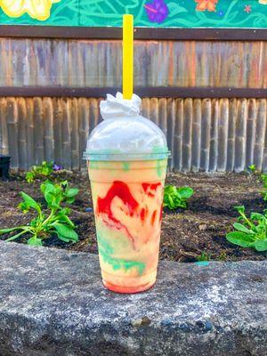 Peach Jet Tea Smoothie + Blue Raspberry Drizzle + Strawberry Drizzle topped with some yummy whipped cream!