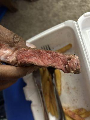 One of the steaks we ordered, it is a 14 ounce ribeye. It was supposed to be cooked medium rare.