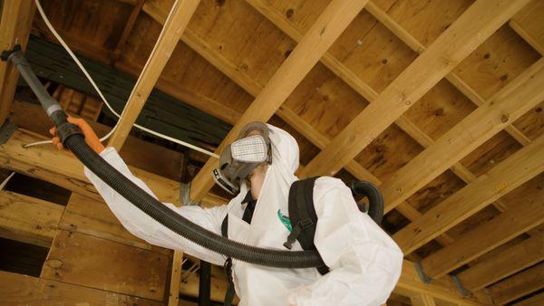 SERVPRO technician cleaning soot after a fire.