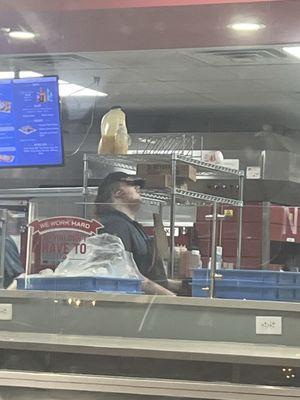 This is the picture of the guy that slammed something down and then made my pizza with his bare hands