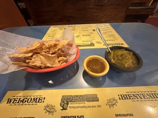 Salsa and warm green chili for your tortilla chips