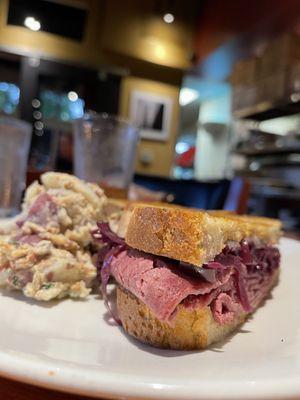 Reuben with potato salad (note the red sauerkraut)