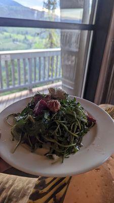 Lodge Salad with arugula, roasted beets, goat cheese, and candied walnuts.