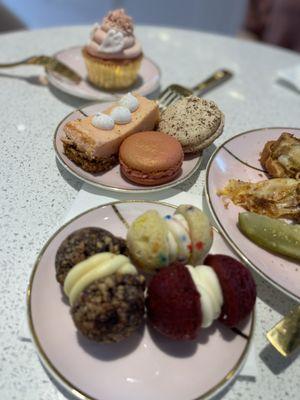 Variety of deliciousness- mini sandwiches, macarons, cupcakes  and many more