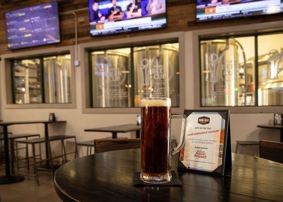 Cherry Creek Food Hall Brewery in the background.  Sip while you see the process