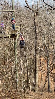 Trust fall and upside down on the zip line