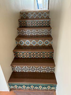 solid wood with spanish tile riser