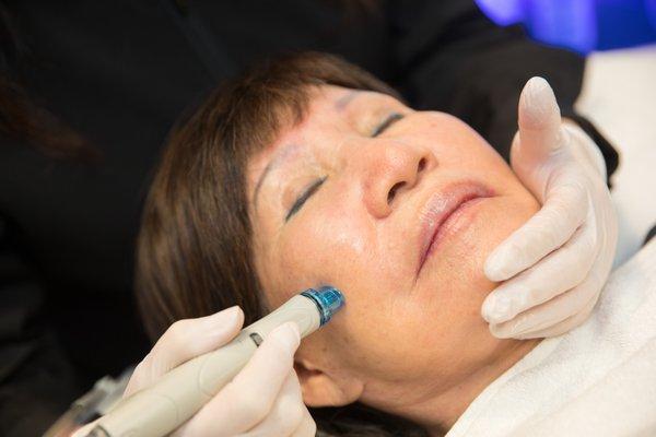 Terrie's mother enjoying a Hydrafacial