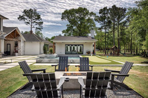 Poolside turf and pavers with putting green installation in Magnolia, TX