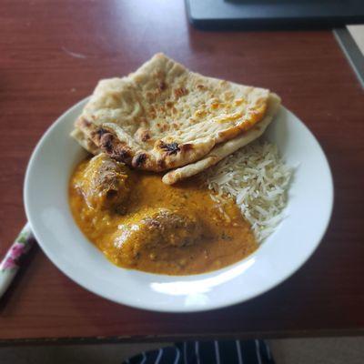 Malai kofta with rice and naan (about 1/2 of the malai kofta, 1/4 of the naan, 1/4 of the rice)