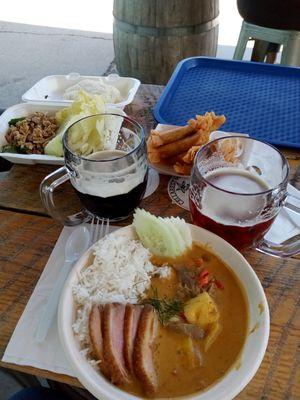 Duck Curry (front) and Chicken Laab Gai (back left), with Firecracker sweet potatoes (back right) and beers from Cellarest Beer Project.