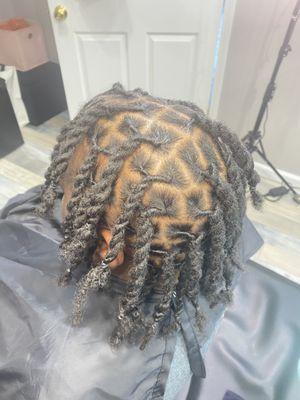 Loc retwist & style