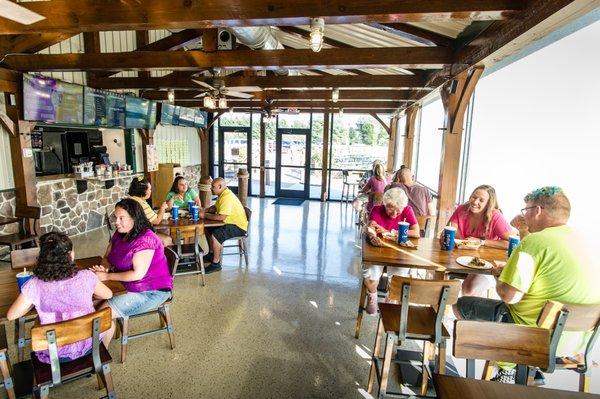 Climate controlled Cafe with frozen treats and a hot food menu.