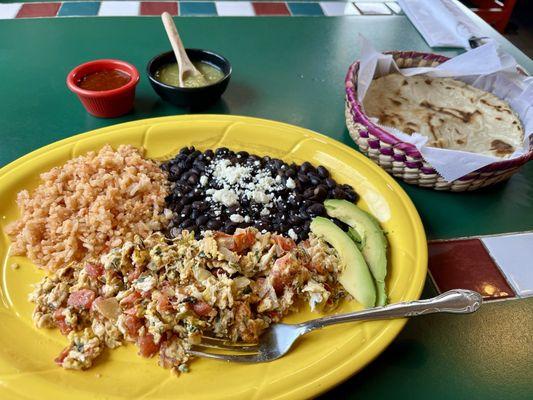 Huevos à la Mexicana with house-made corn tortillas