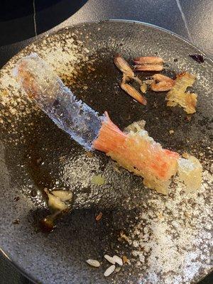 The plastic part of the crab stick not taken off and fried and served