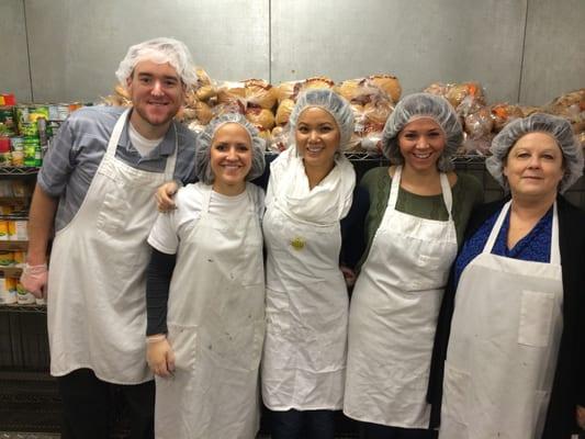 PCVA staff volunteering at the Tacoma Food Bank in 2013