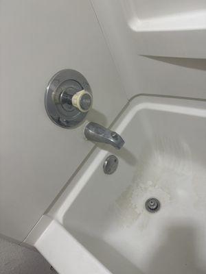 Bathroom stains, possibly hard water.