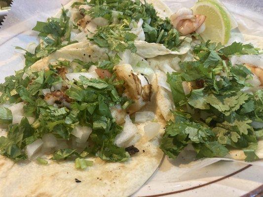 Shrimp tacos with (lots) of cilantro and onions