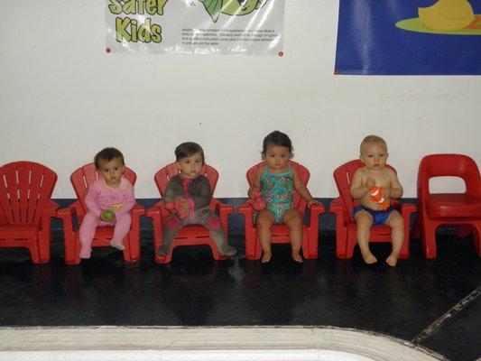 Waiting patiently to be invited in to the pool.  Pool side safety is as important as learning to swim.