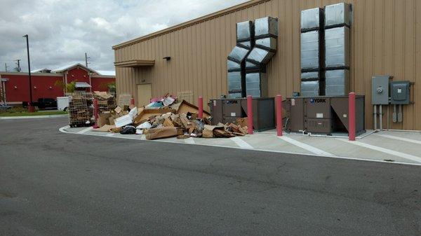 The back of the store. Which you have to drive by to exit the store!!    This has been for at least 2 weeks.