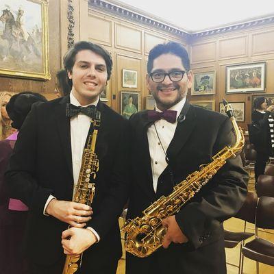 Director Javier Oviedo with student saxophonist Patrick Barnum; Kosciuszko Foundation 11/18