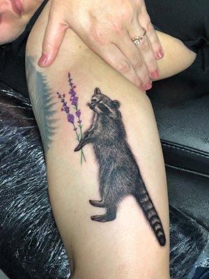 Tattoo of a raccoon