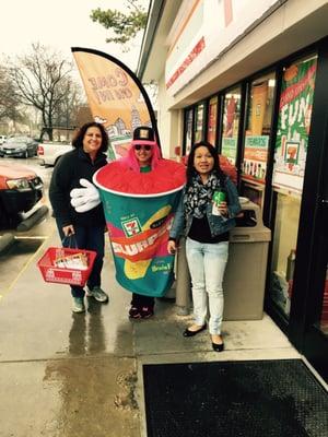 customers Having fun with Slurpee girl