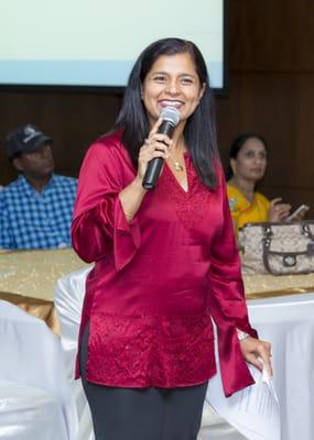 Dr. Savita presenting about Oral health awareness at a Health Fair