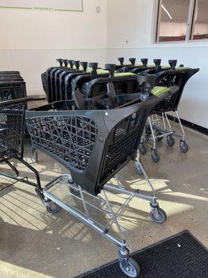 Brand new shopping carts are sleek, easy to push/turn, and have cup holders!