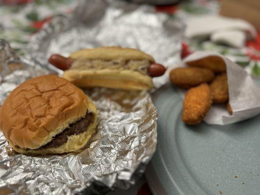 Regular Hamburger, Hotdog with Sauerkraut, and jalapeño poppers.