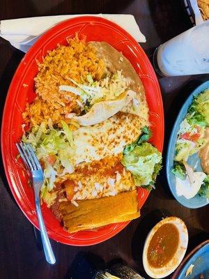 No. 3 Combination Plate One cheese enchilada, one beef taco, one chile relleno, one pork tamale, served with beans, rice and guacamole.