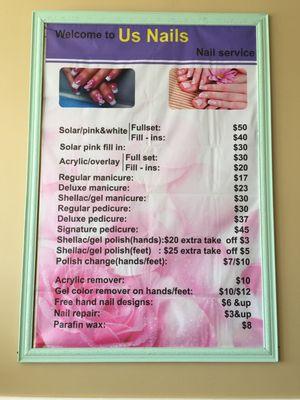 US Nails Large pricing Menu that is hanging up on the wall to your left when u first walk in.