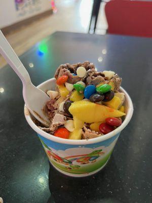 Thai Rolled Ice Cream. Check out the fresh Mango chunks! +White chocolate chips, M&Ms, and LOTS more choices.