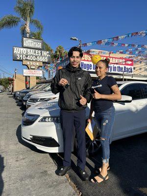 Happy mother and son with their beautiful acura tlx