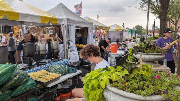 Behind food vendors