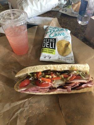 Chief John sub with sour cream and chive chips. The drink is an Autumn from Sassafras.