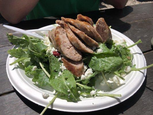 House made brat on arugula.