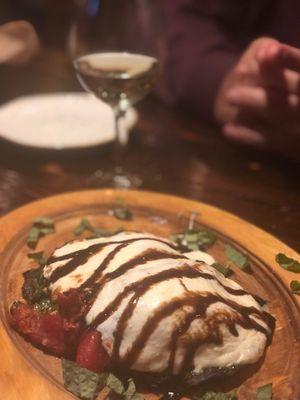 Stuffed grilled portobello mushroom.