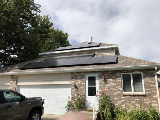 Two arrays of Trina Solar panels on a home in Kaysville.