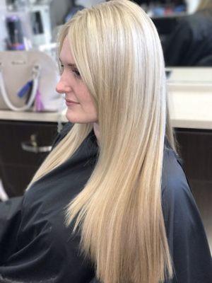 Painted pretty blonde highlights for this beauty's summer hair