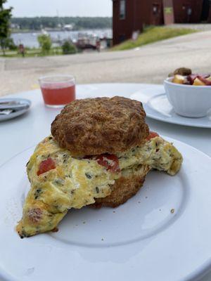 Egg sandwich with herbs and tomatoes on a rocking biscuit.  Yum!!!