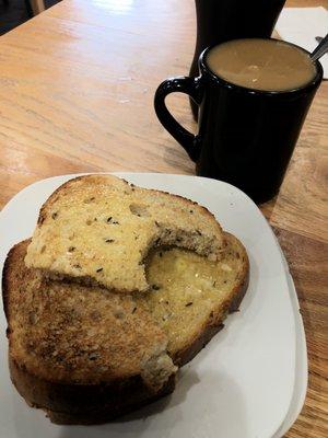 Wonderfully thick buttery rye toast with coffee