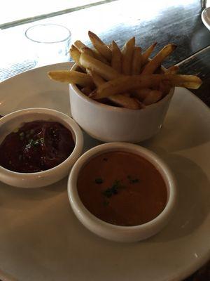 Fries with spiced ketchup and chipotle sauce