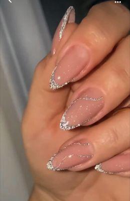 This is the photo I showed him ahead of time and he said he could do it. I was charged $55 and my nails do not look like this at all