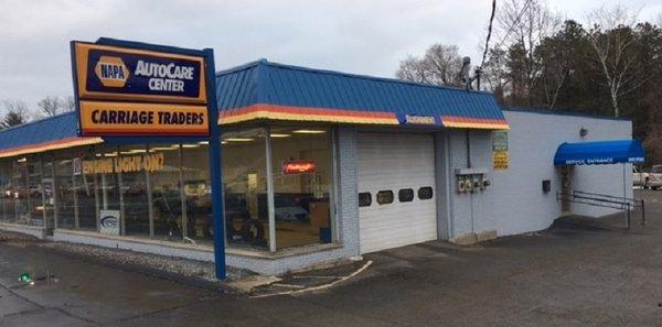 Our enterance is on the side with the blue awning at the light at the intersection of Route 9 and William Street.