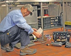 Glenn working on small reach in cooler.