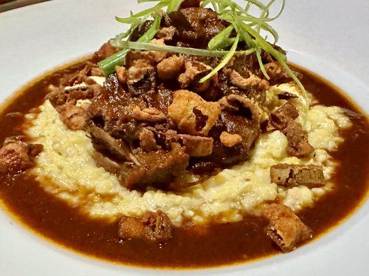 Braised Short Rib with bleu cheese shagbark heirloom grits, BB "jus" sauce, fried leeks