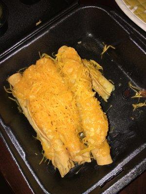 5 Rolled Tacos stuck together