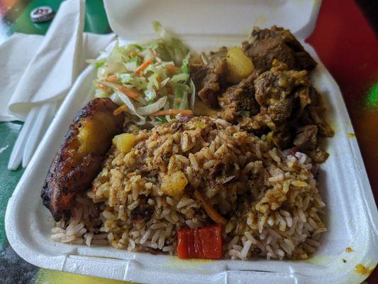 Curry Goat, rice and peas, cabbage, and plantain